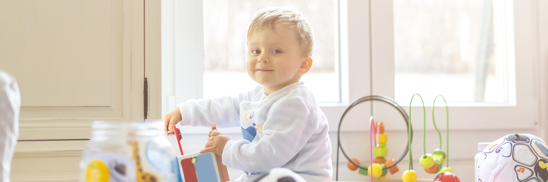 Little boy playing with toys
