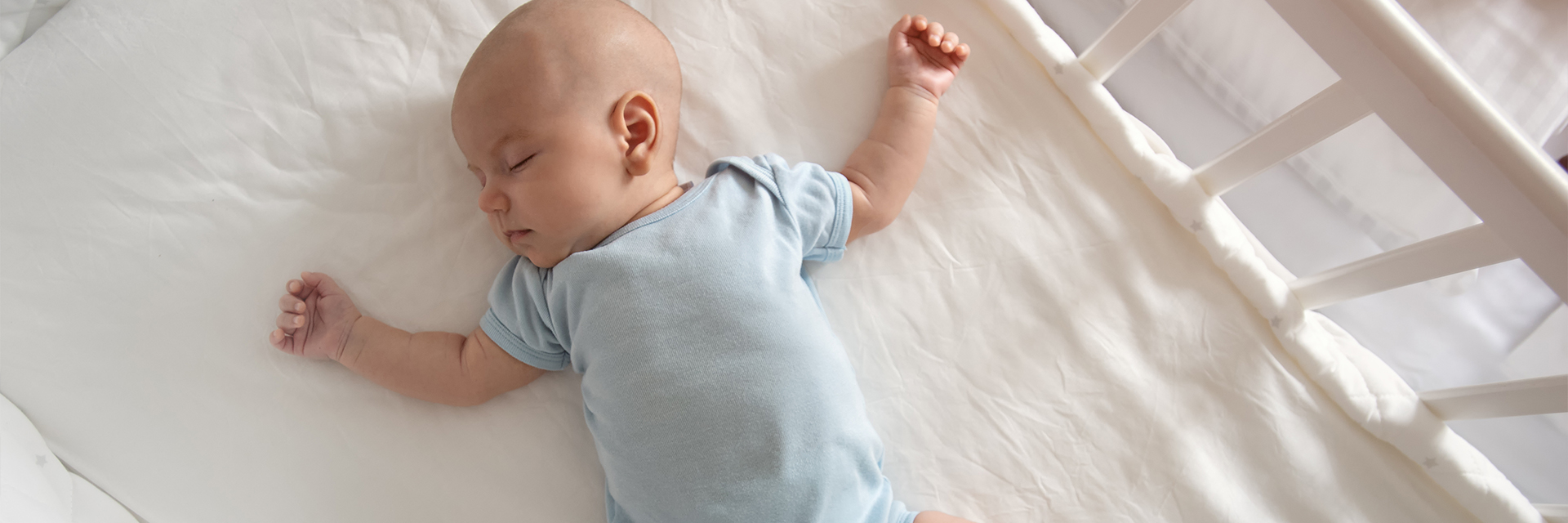 Baby sleeping in crib