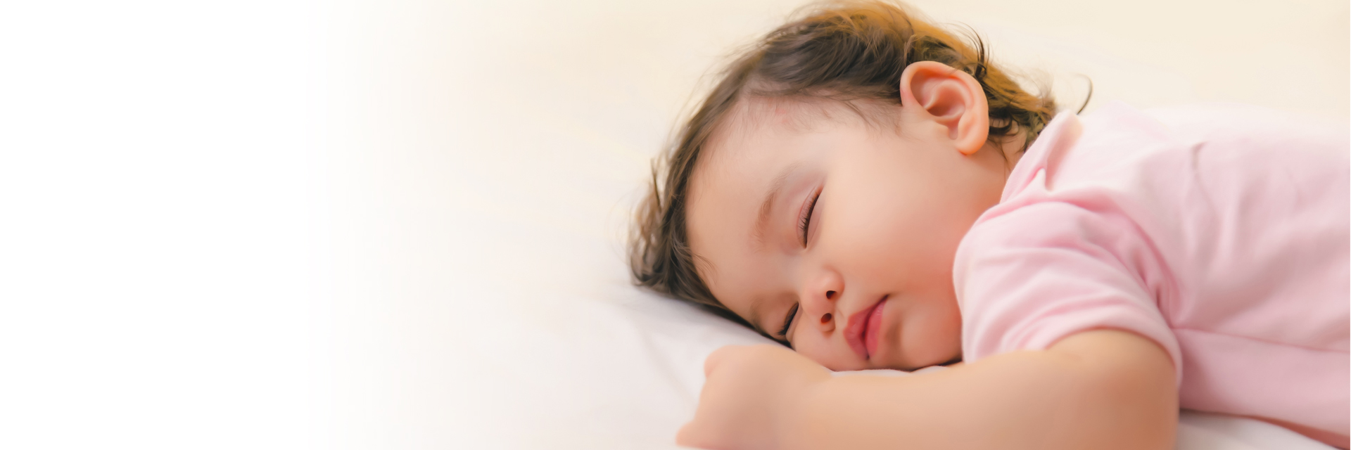 Infant baby sleeping on bed