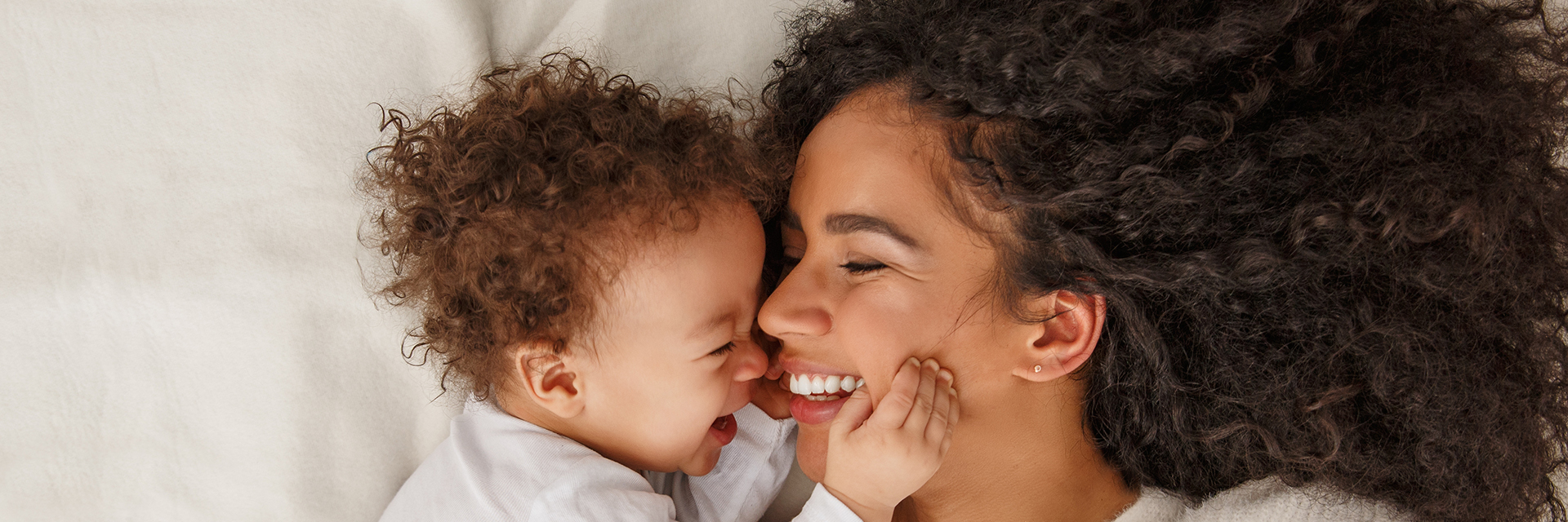 Smiling baby and mom