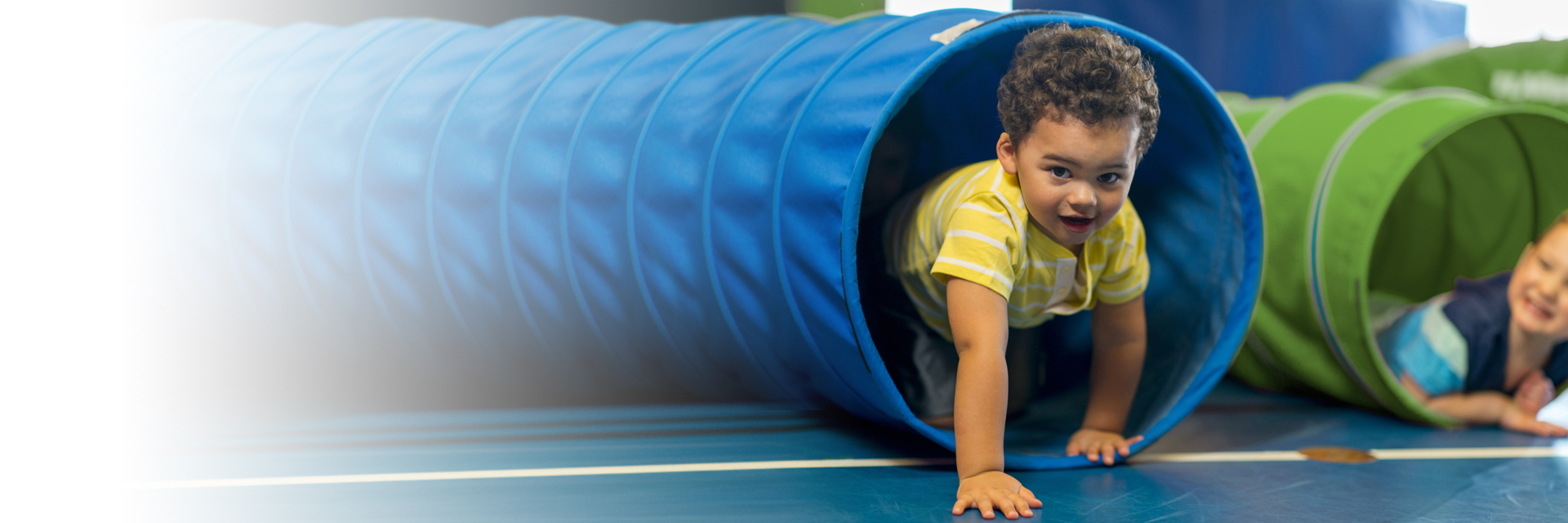 Boys playing in tubes