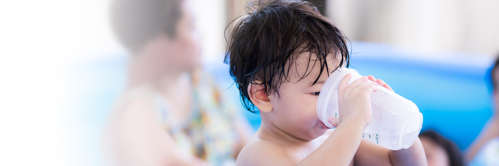Little boy drinking water