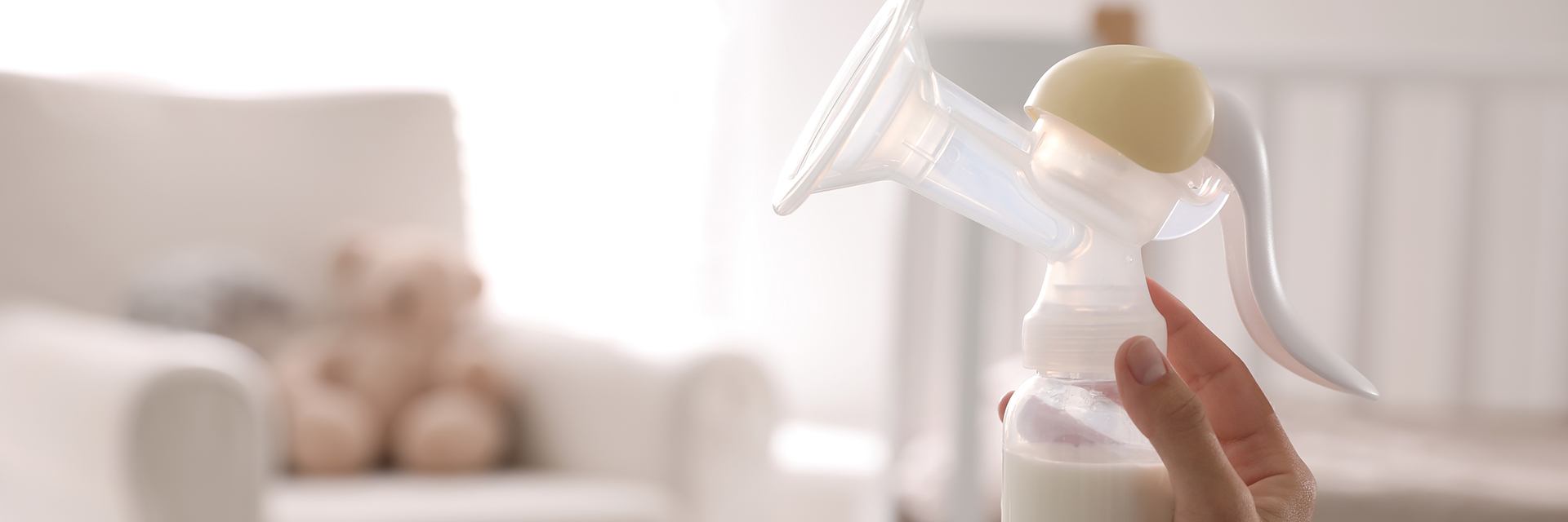 Woman holding breast pump
