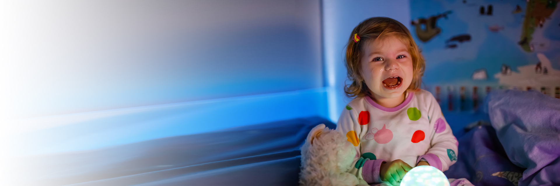Little girl smiling in room