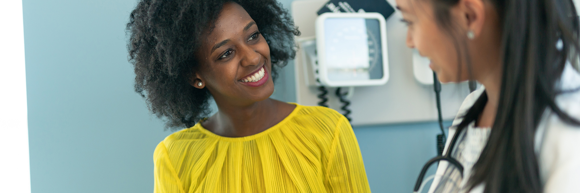 Female patient smiling at provider