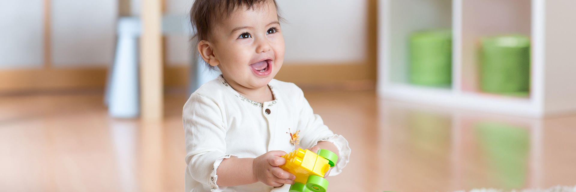 Baby playing with legos