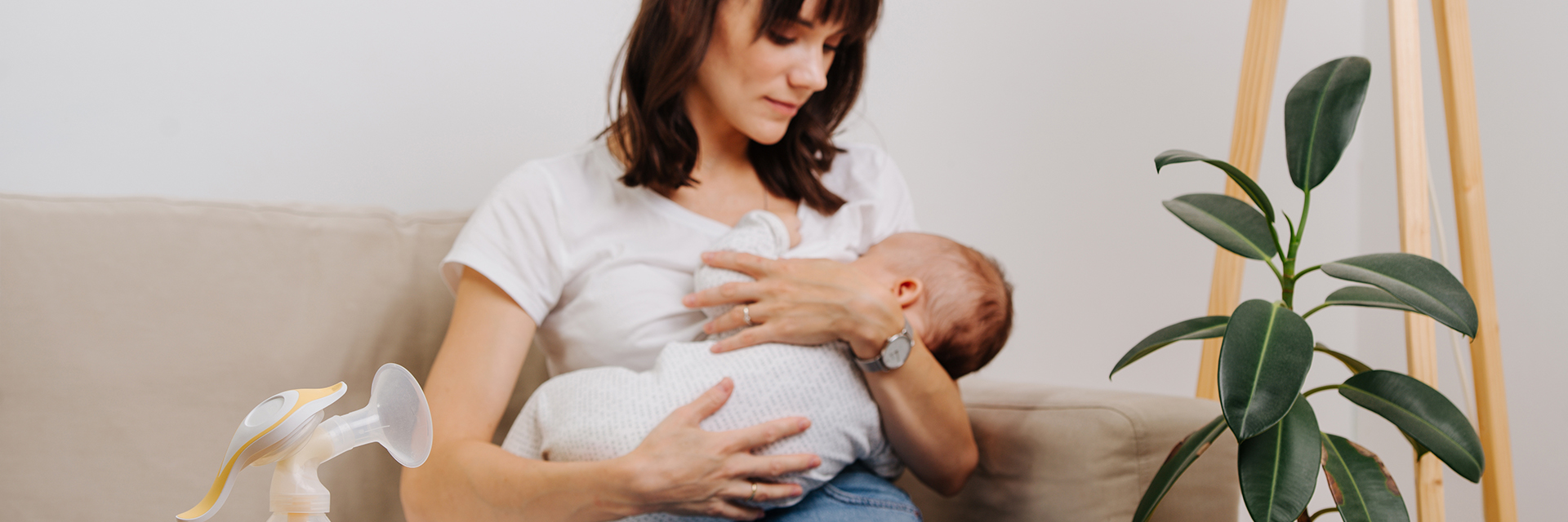Mom breastfeeding baby