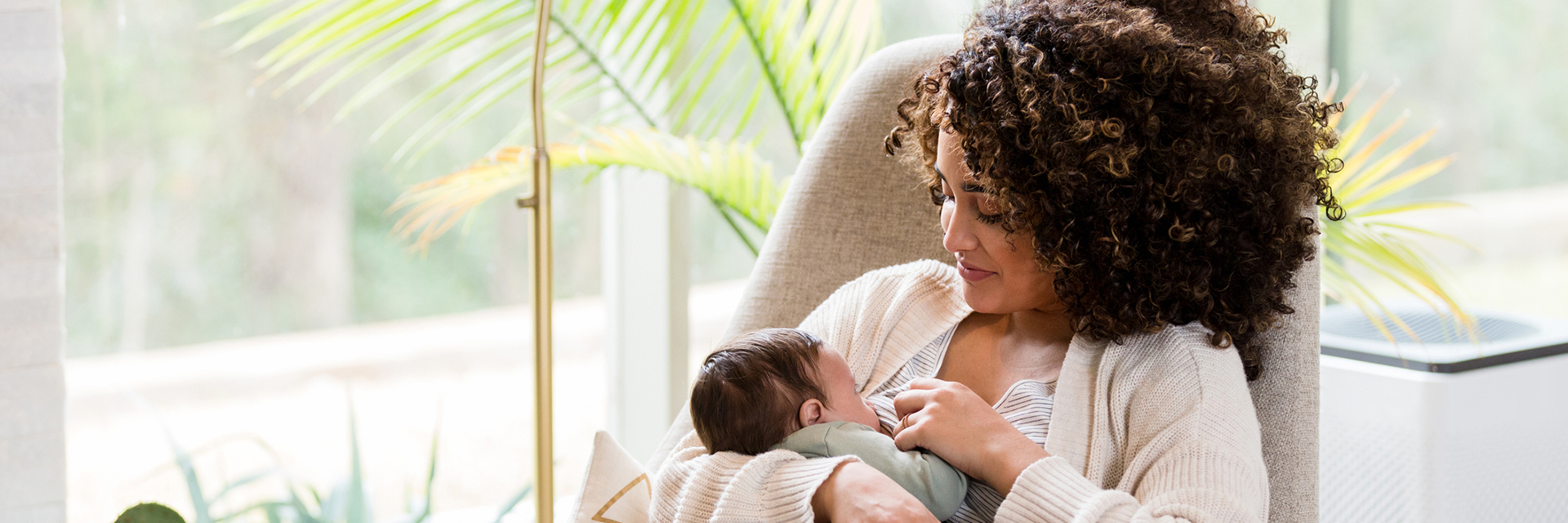 Mom breastfeeding baby
