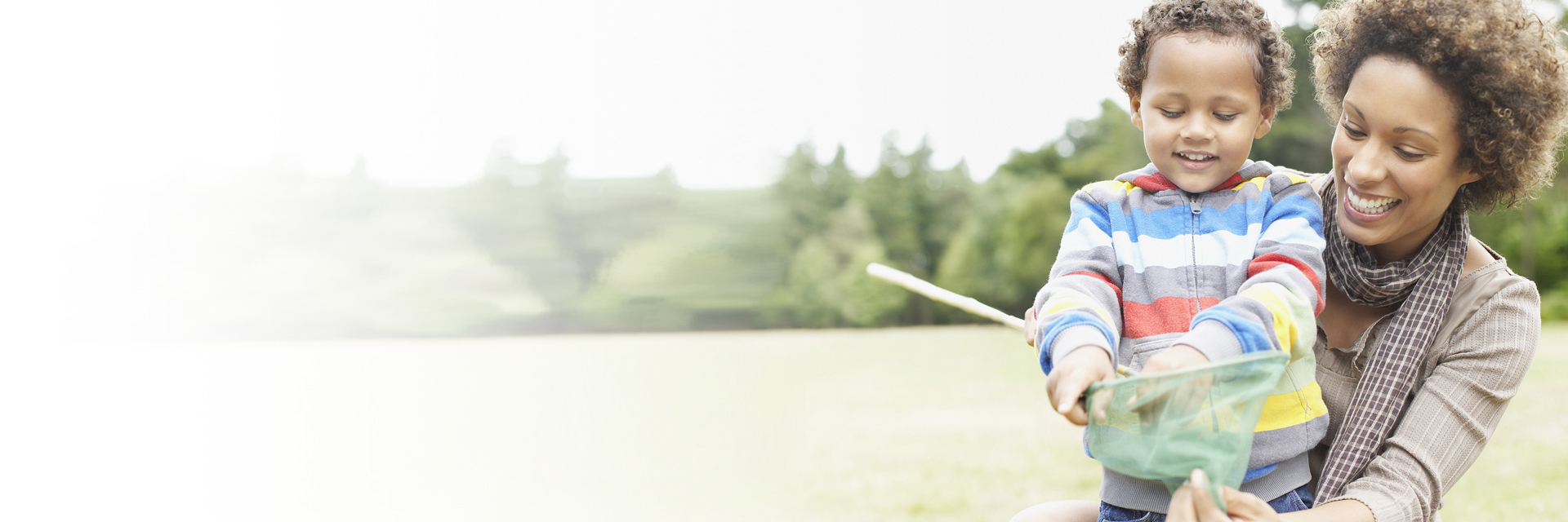 Mom and son playing outdoors