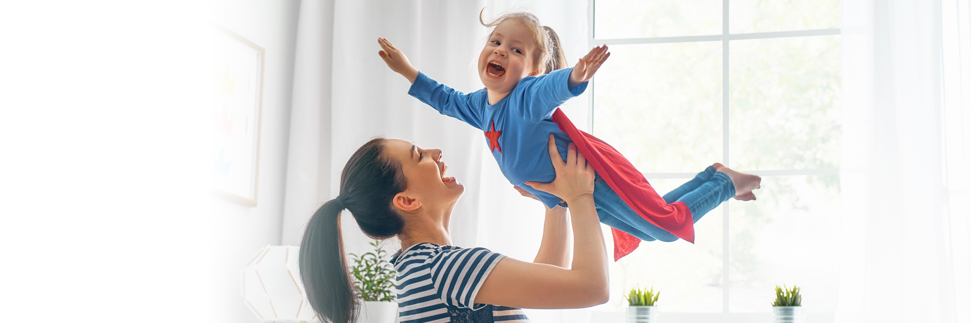 Mom playing with daughter