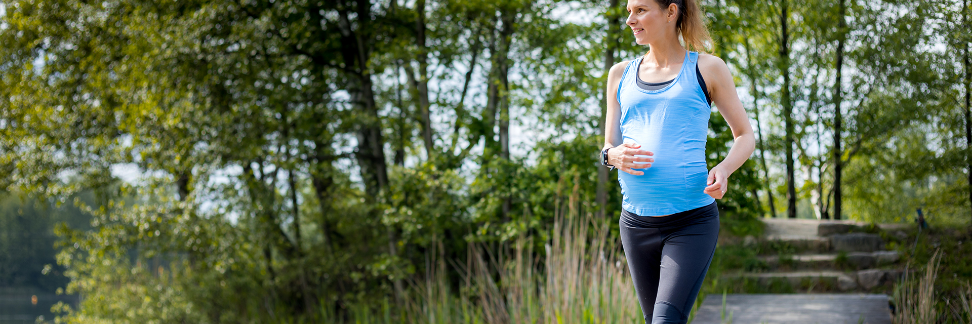 Pregnant woman exercising outdoors