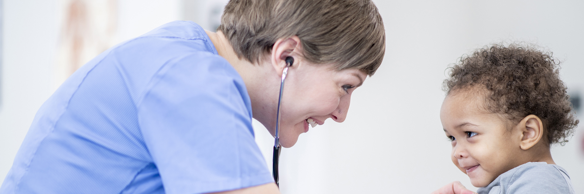 Doctor examining baby
