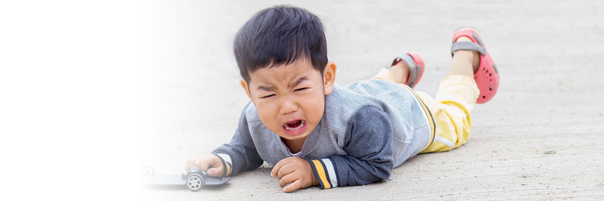 Toddler boy having a temper tantrum