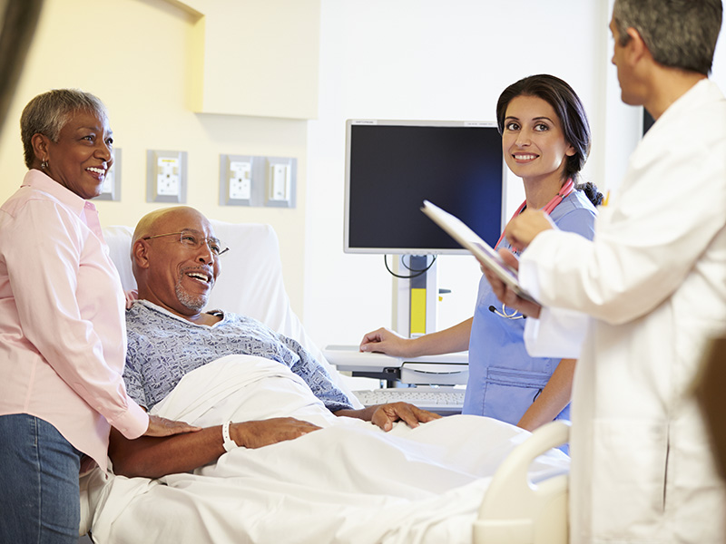 Couple with medical staff