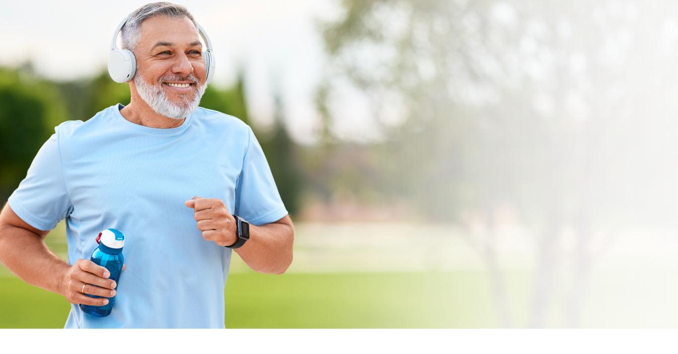 Mature man running outdoors