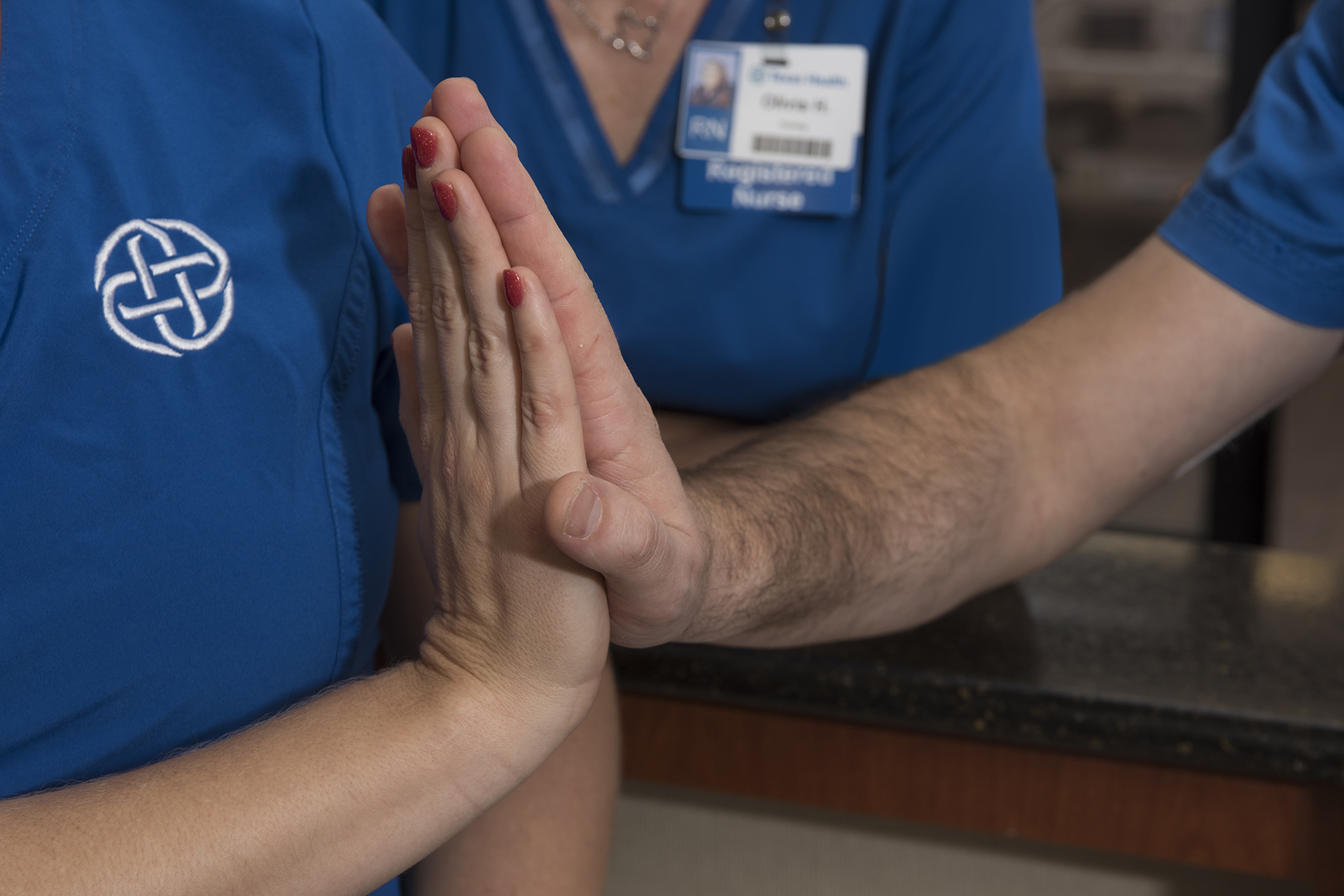 Employees high five