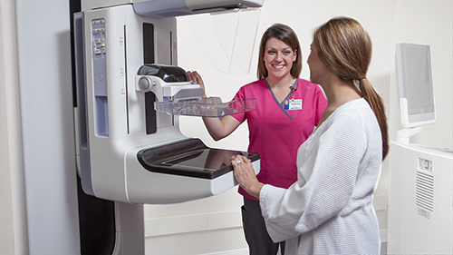 Woman getting mammogram