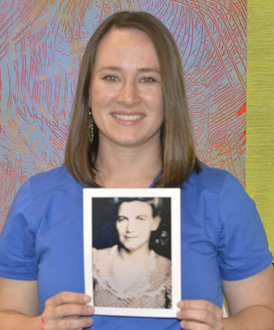 Emily Escobar Holding an Image of her great-grandmother Ima Hazel Barnett 