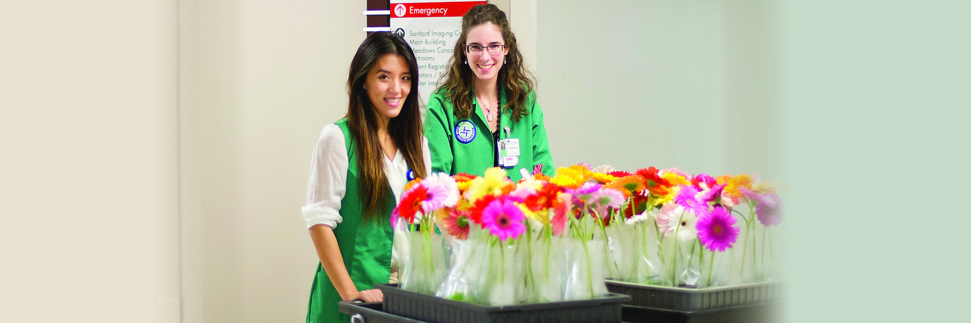 Junior Volunteers Delivering Flowers