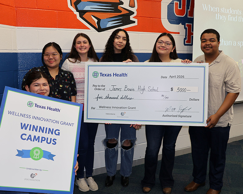 Bowie High School students with check