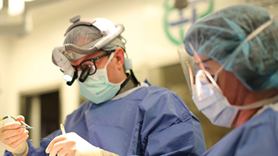 Doctor performing surgery