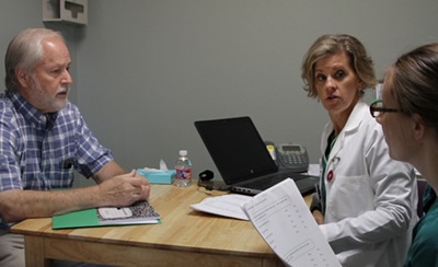 Stroke patient Steve Hooker with speech-language pathologists Heather Parks, left, and Paula Couch during a therapy session at Texas Health Denton.