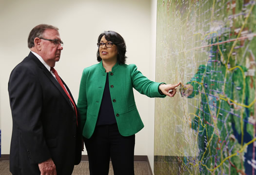 Garry Hamilton, chairman of the Texas Health Community Impact Board, and Catherine Oliveros, vice president of Community Health Improvement.