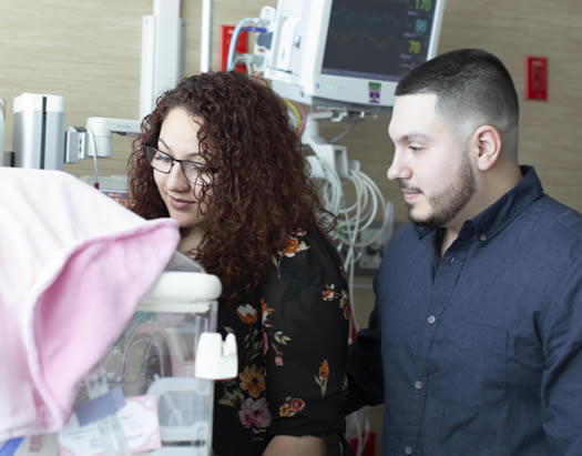 Ilaissa Negron and Ernesto Chapa visit their daughter, Elena Chapa