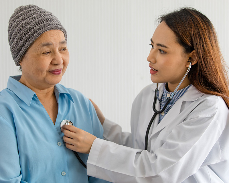 Medical student with patient Medical student with patient