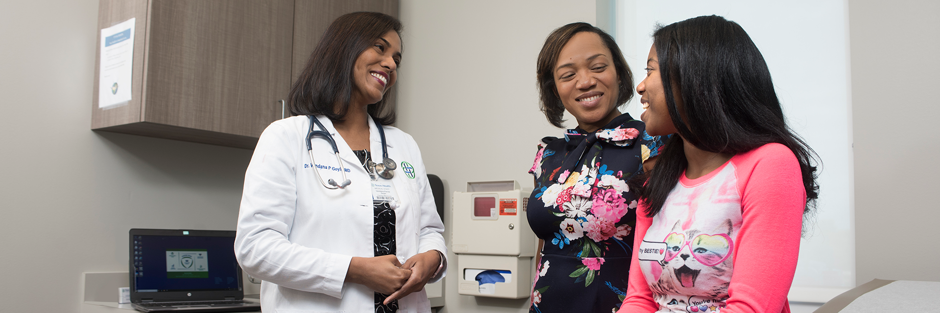 Physician with mother and daughter