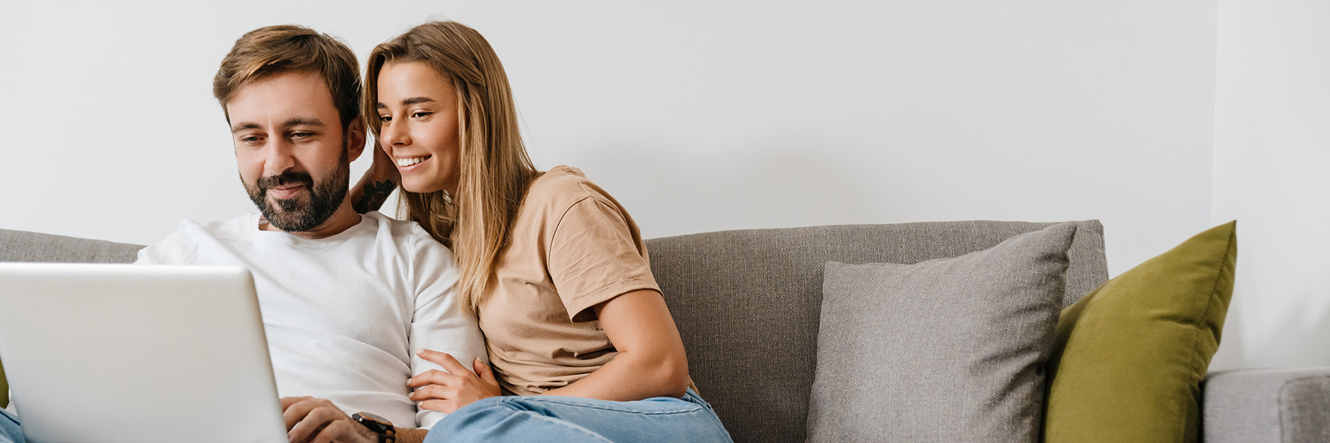 Couple using laptop
