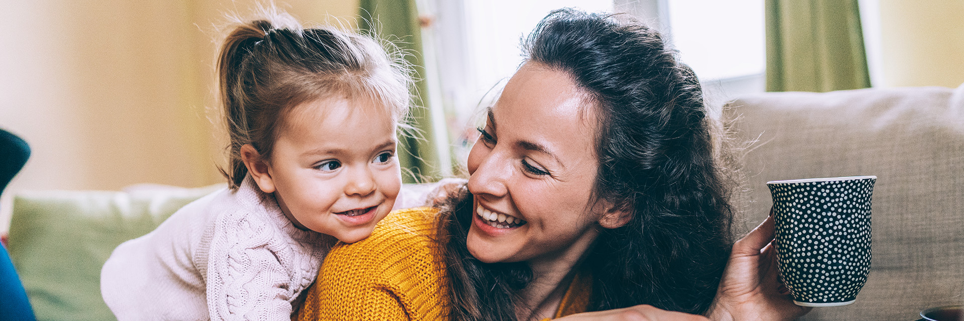 Mom and daughter playing
