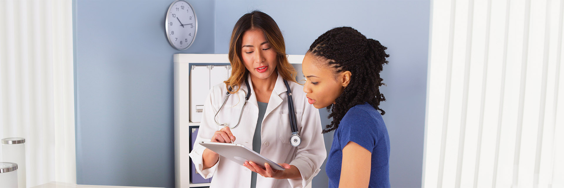 Female patient and provider consulting