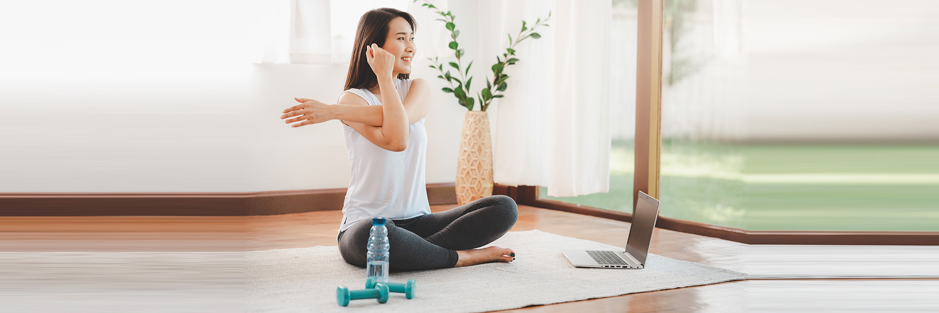 Woman sitting and stretching