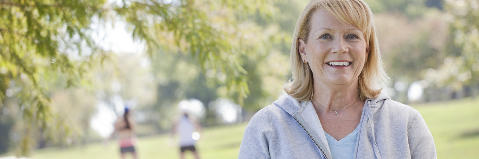 Middle aged woman outdoors in park
