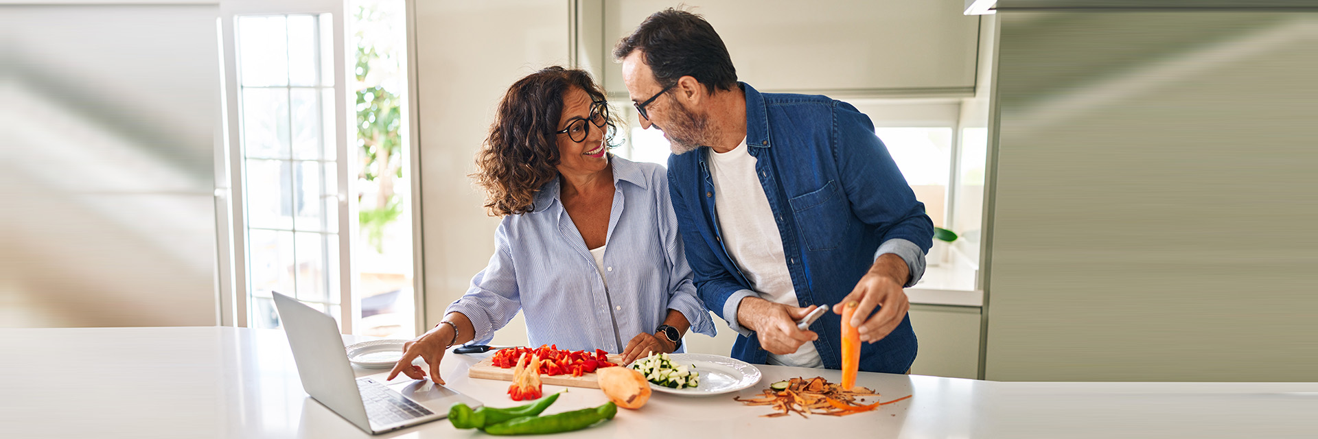 Couple cooking in kitchen