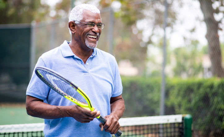 Man holding tennis racket