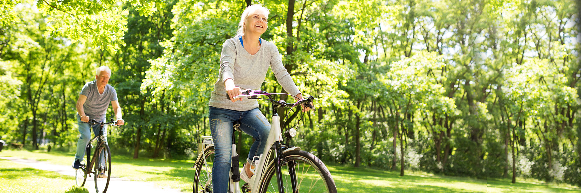 Couple Riding Bikes in the Park