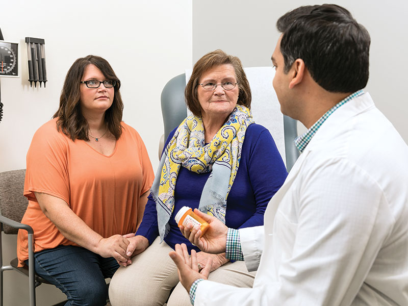 Doctor with Family Patients