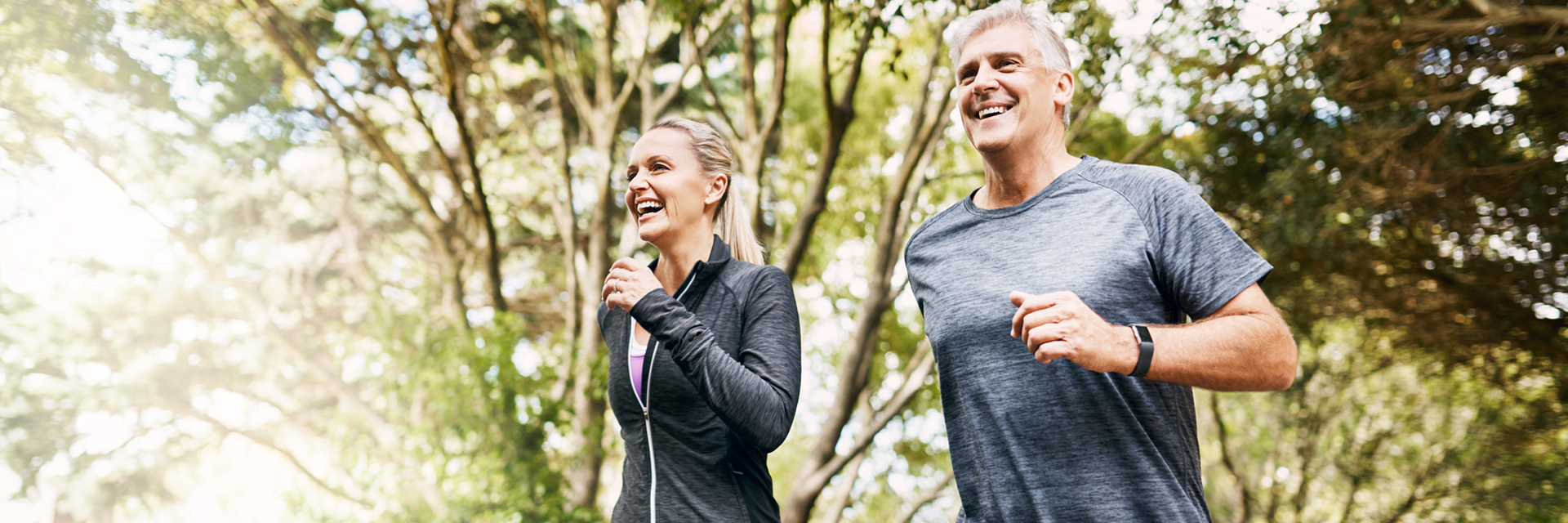 Man and woman jogging outside